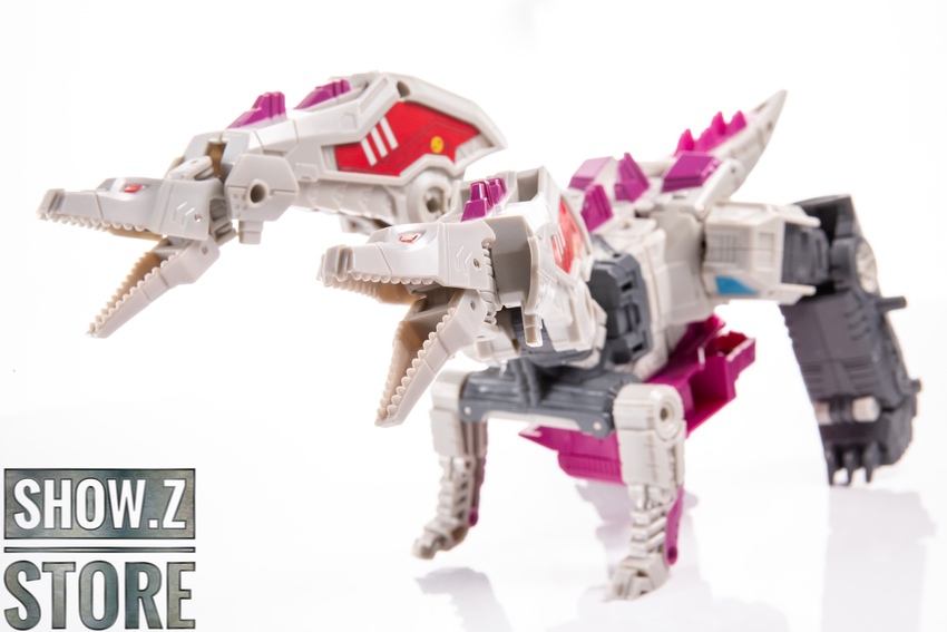 Hun-Gurrr dinosaur mode with white head and grey body in action pose Hun-Gurrr dinosaur mode with white head and grey body in action pose