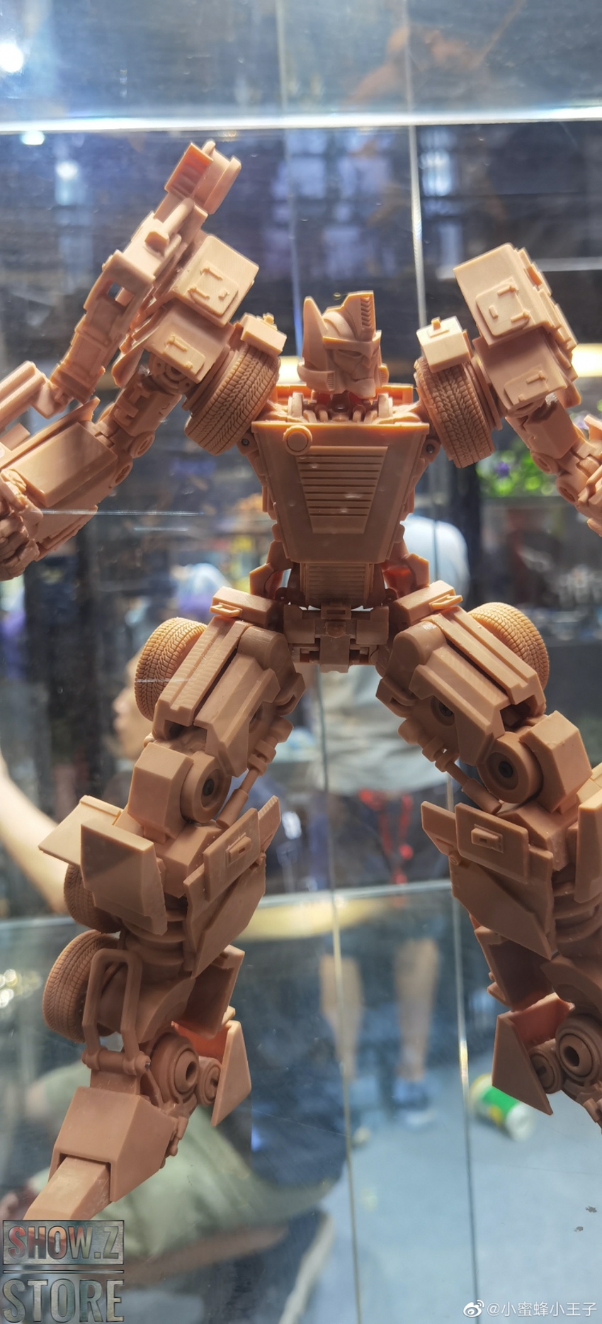 Bonecrusher black tan robot full body angle with extended arms Bonecrusher black tan robot full body angle with extended arms