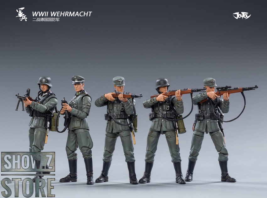 WWII German soldiers action poses holding machine guns WWII German soldiers action poses holding machine guns