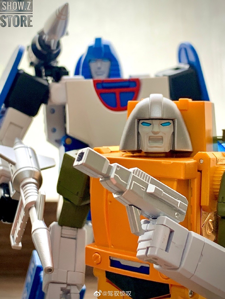 Orange green Brawn robot with blue robot figure background Orange green Brawn robot with blue robot figure background