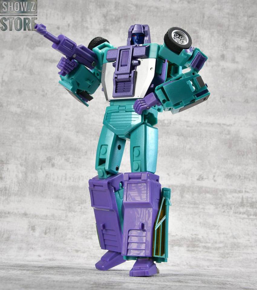 Teal purple transformer with articulated limbs posed Teal purple transformer with articulated limbs posed