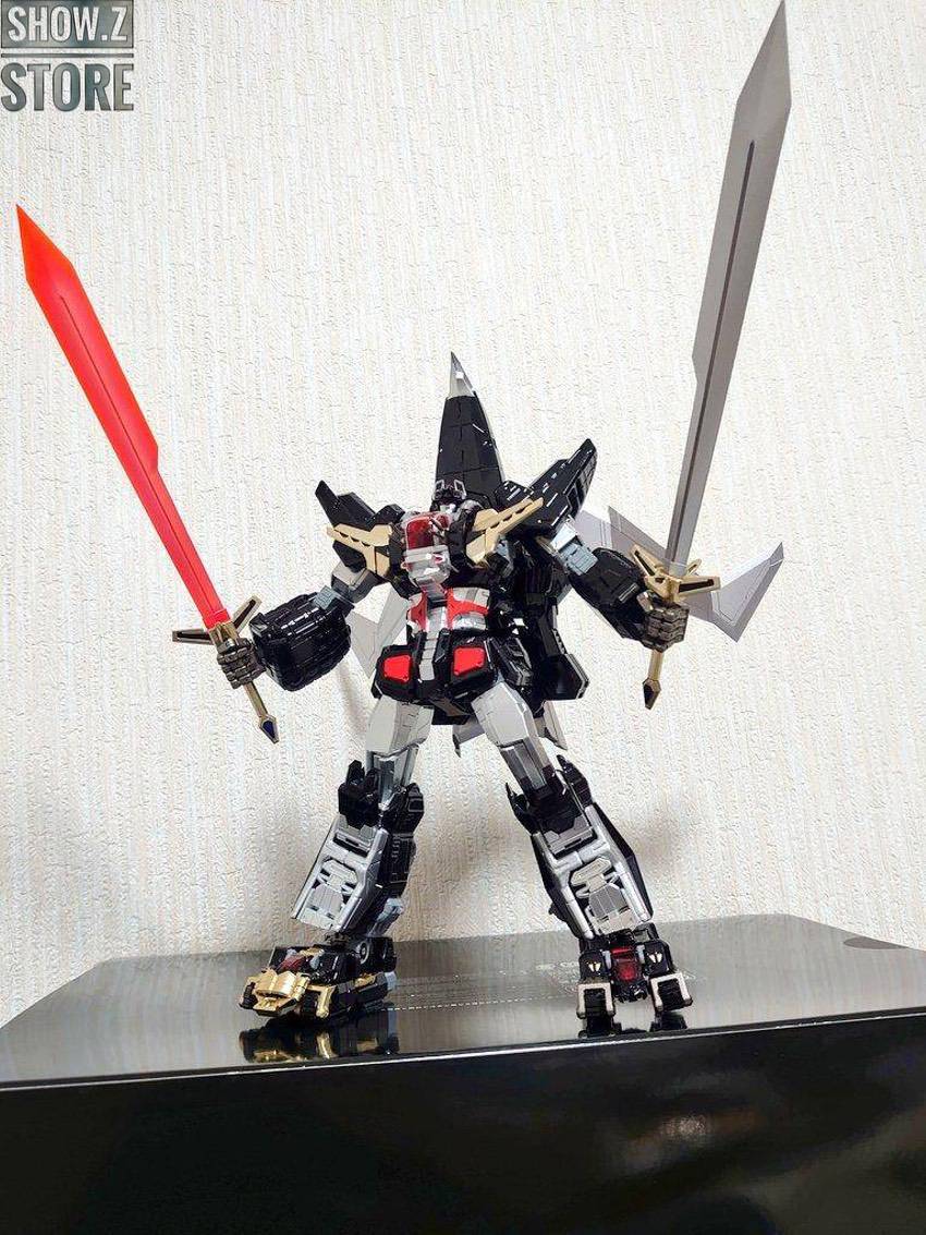 Red and white beast machine god figure in fully assembled form Red and white beast machine god figure in fully assembled form