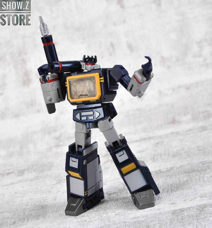 Tan metallic Soundwave robot with blue effects in martial stance Tan metallic Soundwave robot with blue effects in martial stance