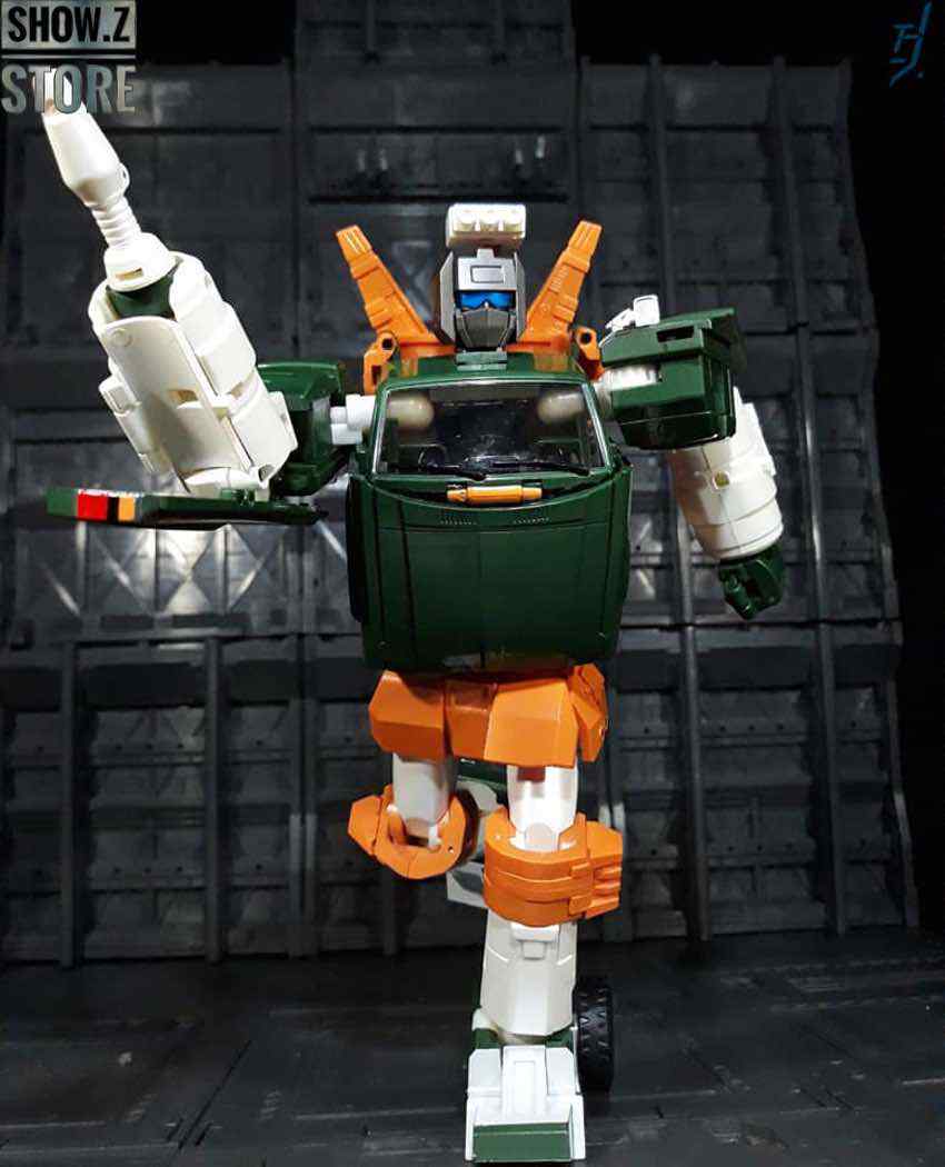 X-Transbots Paean Hoist green white orange robot dark background X-Transbots Paean Hoist green white orange robot dark background