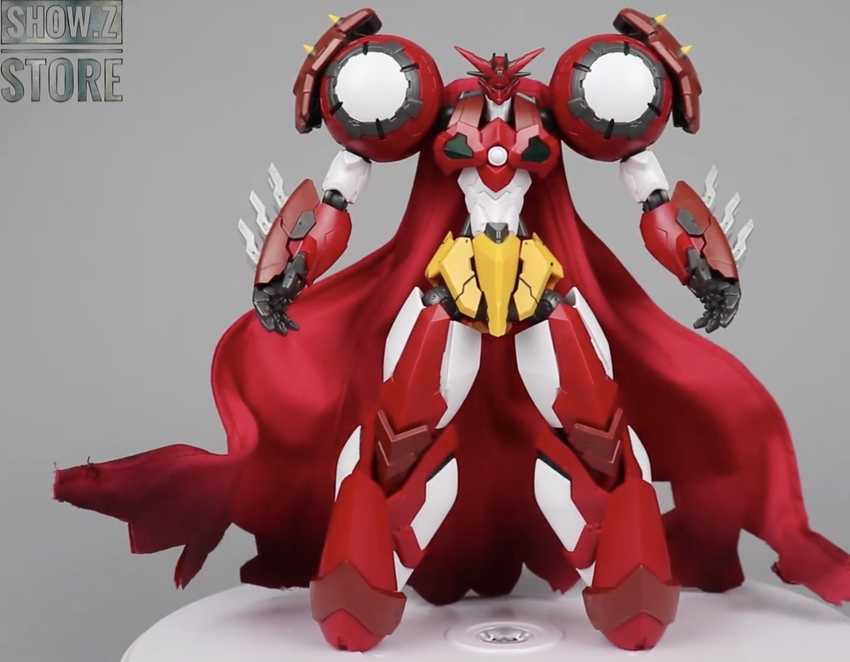 Robotic figure with articulated wings and combat ready pose Robotic figure with articulated wings and combat ready pose