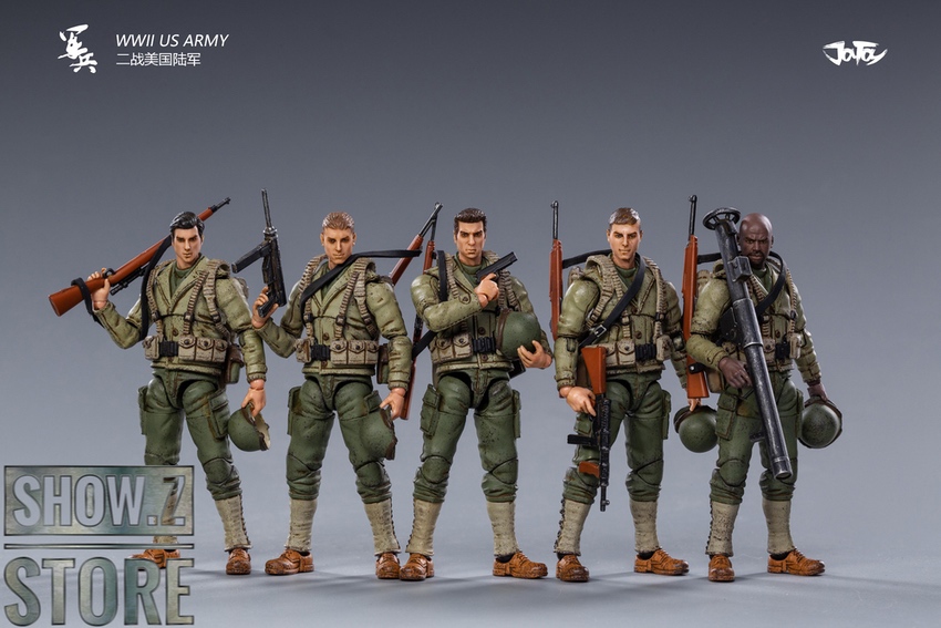WWII soldiers in tan uniforms with different weapons in lineup WWII soldiers in tan uniforms with different weapons in lineup