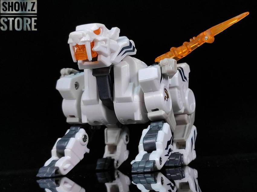 White beast figure with orange tiger head markings White beast figure with orange tiger head markings