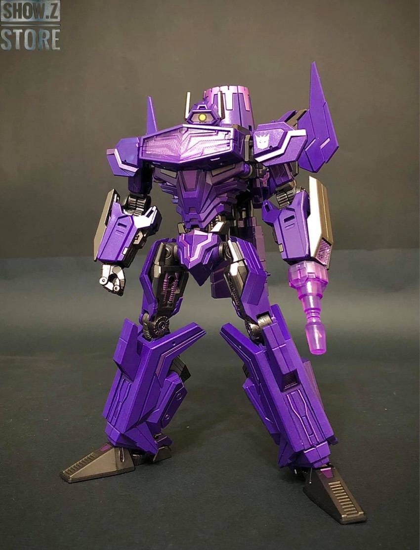 Purple Coeus Shockwave robot standing in neutral pose with raised hands Purple Coeus Shockwave robot standing in neutral pose with raised hands