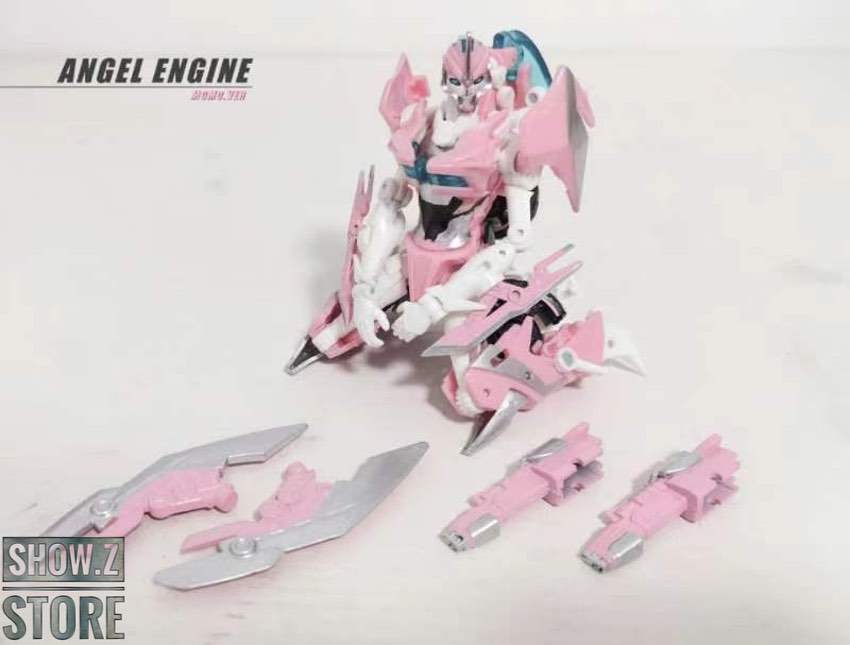 Pink and white Arcee robot in motorcycle form Pink and white Arcee robot in motorcycle form