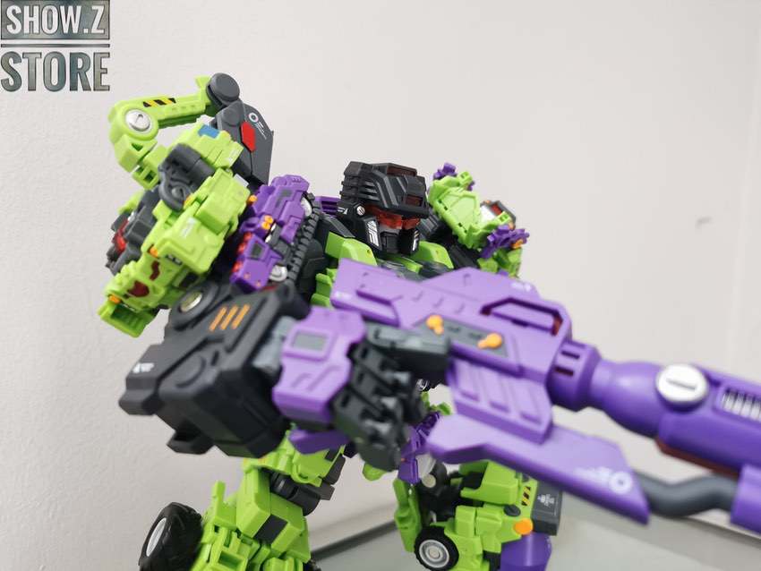 Demolisher Devastator holding large purple cannon weapon overhead Demolisher Devastator holding large purple cannon weapon overhead