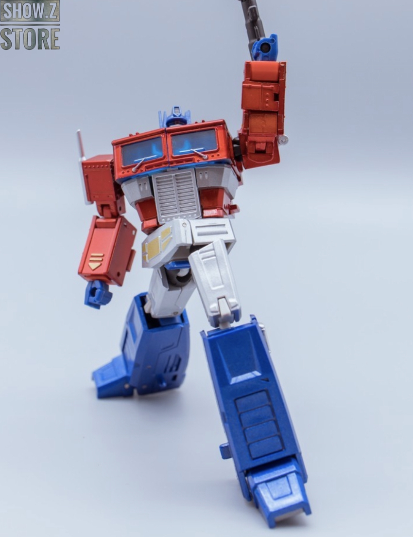 Optimus Prime G1 style robot with red upper body and blue lower legs Optimus Prime G1 style robot with red upper body and blue lower legs