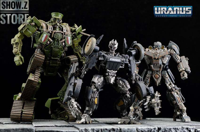 Green and gray robot figures standing together in formation Green and gray robot figures standing together in formation