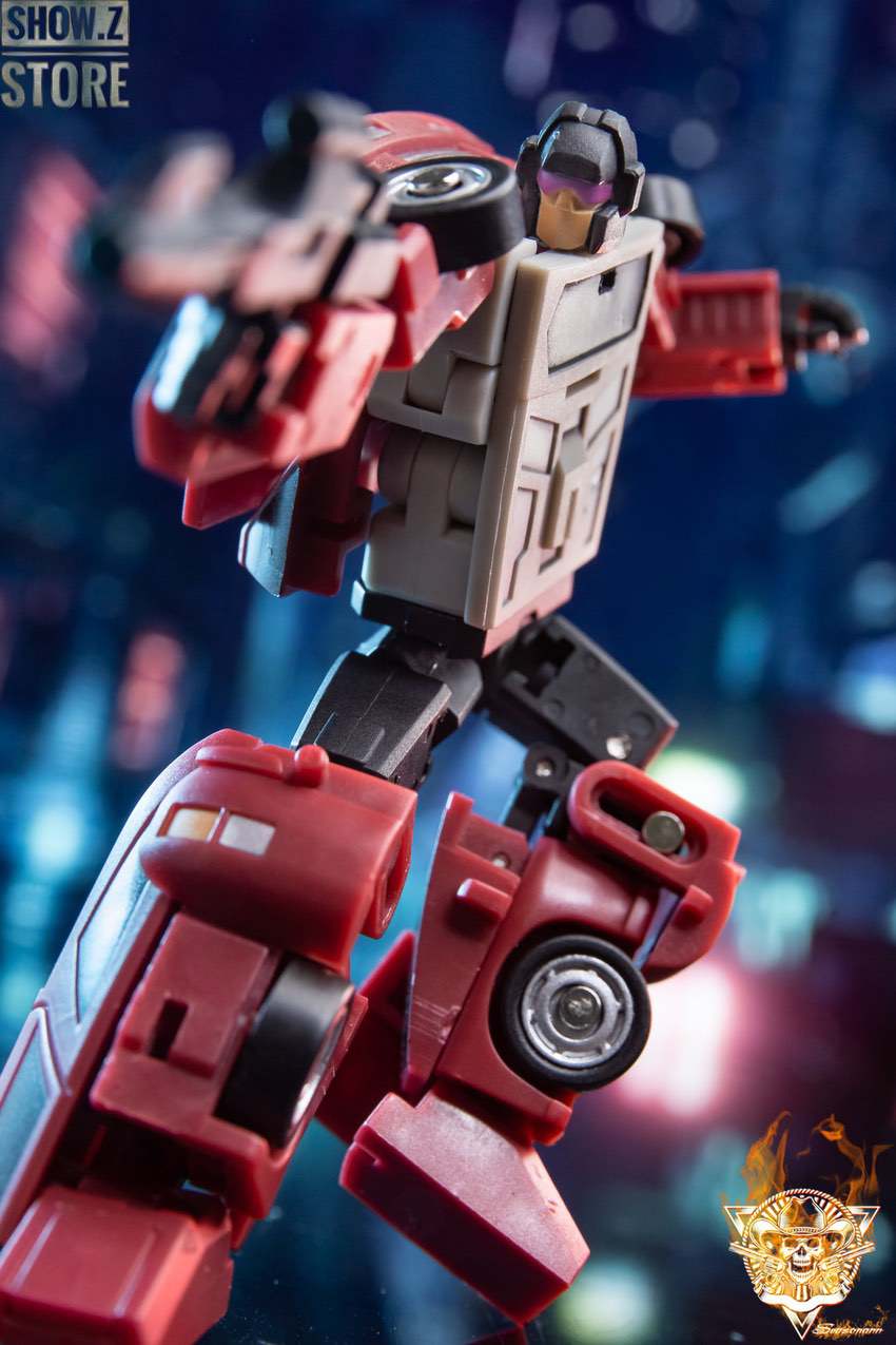Red and white Pillage robot with blue detailing dark background Red and white Pillage robot with blue detailing dark background