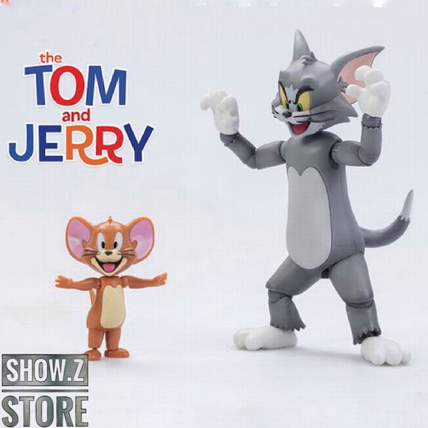 Tom cat figure posing with Jerry mouse Tom cat figure posing with Jerry mouse