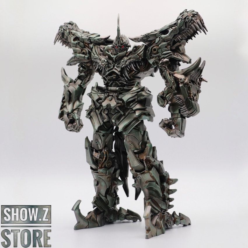 Green and tan armored Grimlock battle damaged Green and tan armored Grimlock battle damaged