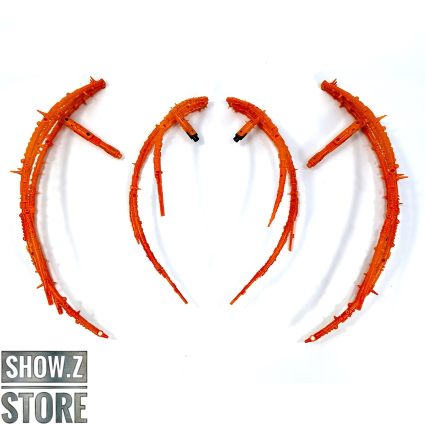 Bright red curved accessory pieces with spikes Bright red curved accessory pieces with spikes