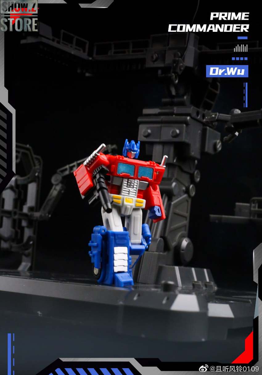 Robot figure with trailer in background Robot figure with trailer in background