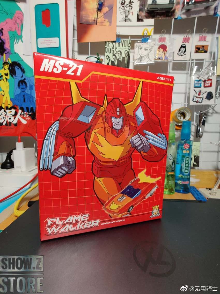 Red and yellow Flame Walker robot with fire-themed armor in box Red and yellow Flame Walker robot with fire-themed armor in box