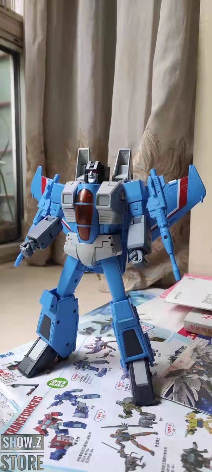 Thundercracker blue jet aircraft transformer in robot pose Thundercracker blue jet aircraft transformer in robot pose