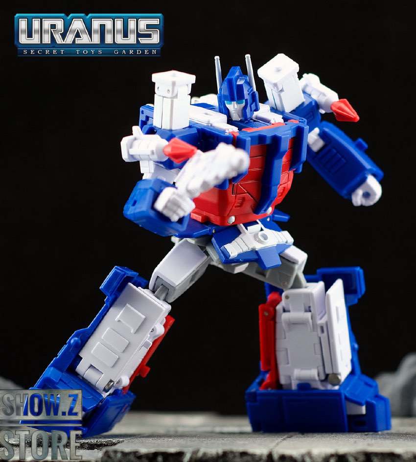 Newage Octavian gray white and blue Autobot standing in neutral stance Newage Octavian gray white and blue Autobot standing in neutral stance