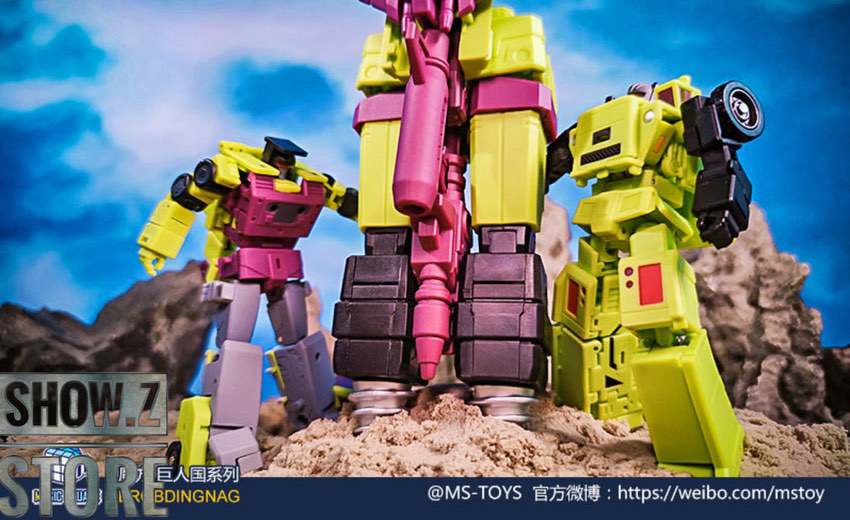 Two yellow construction vehicle robots set transformation display Two yellow construction vehicle robots set transformation display