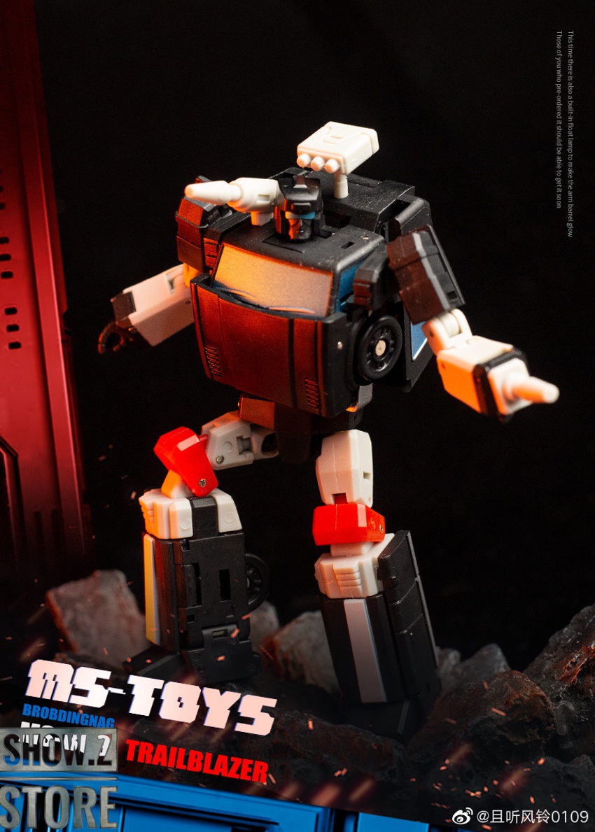Orange and black colored robot warrior with bright blue accents Orange and black colored robot warrior with bright blue accents