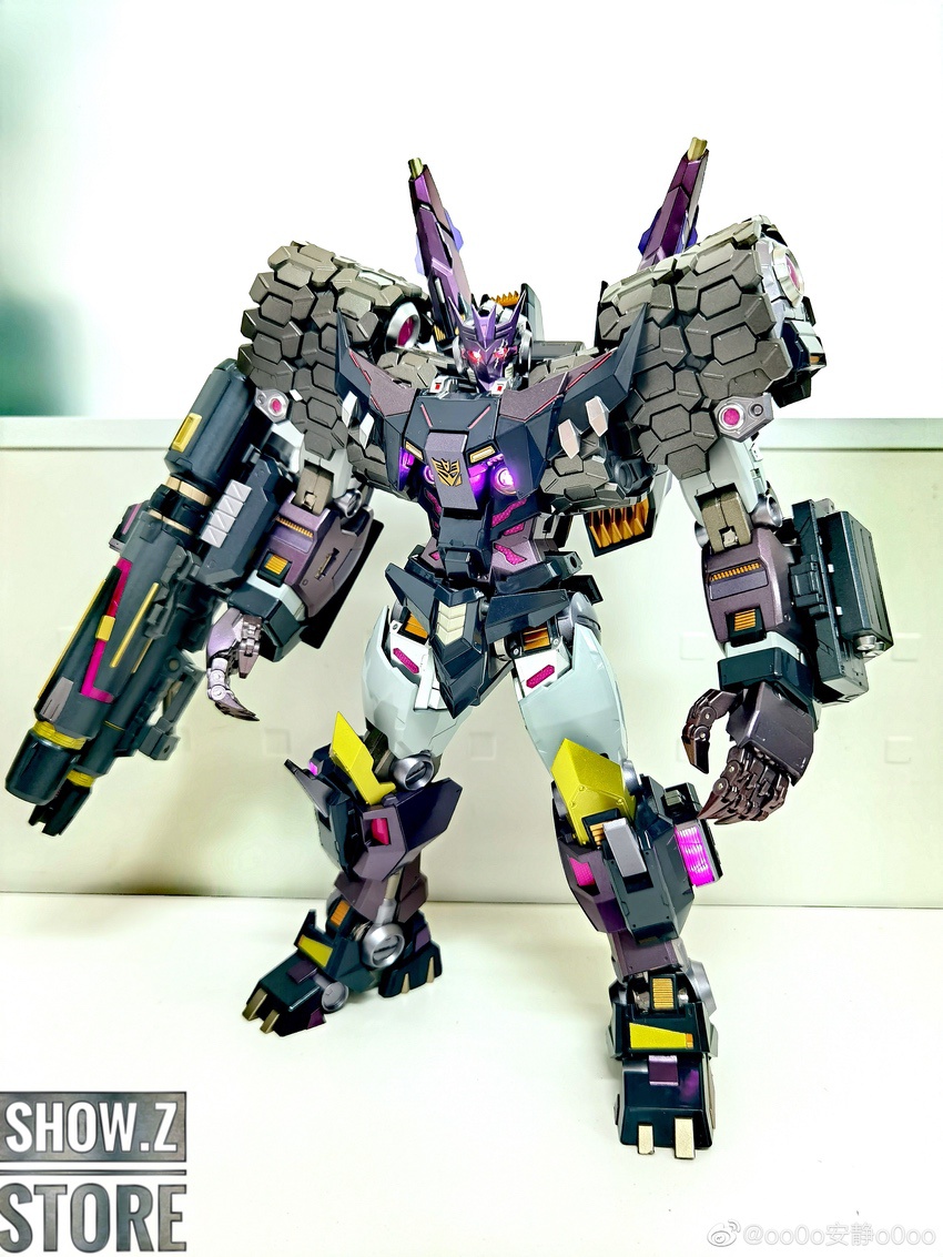 Heavily armored purple and black robot mode displayed Heavily armored purple and black robot mode displayed
