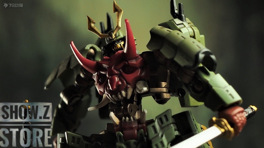 Demon warrior robot with green armor red accents and multiple sharp horns and weapons Demon warrior robot with green armor red accents and multiple sharp horns and weapons