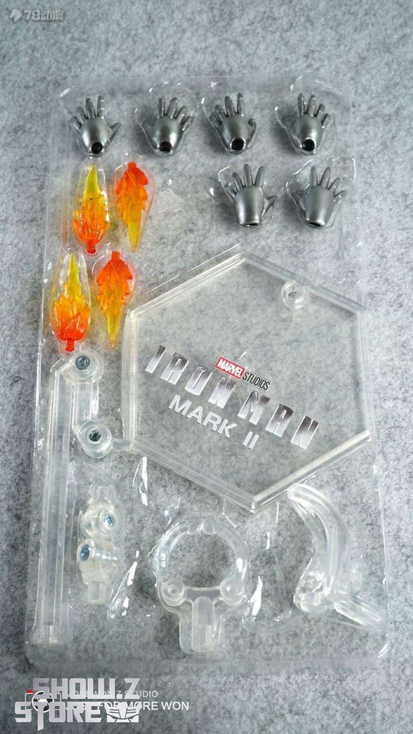 Iron Man Mark 2 figure holding weapon and action accessories Iron Man Mark 2 figure holding weapon and action accessories
