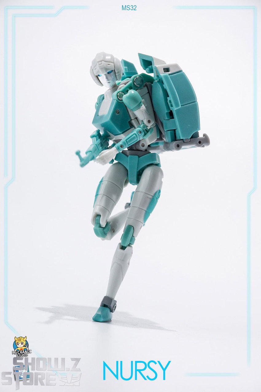 Arcee side profile teal white color scheme armed stance rifle Arcee side profile teal white color scheme armed stance rifle