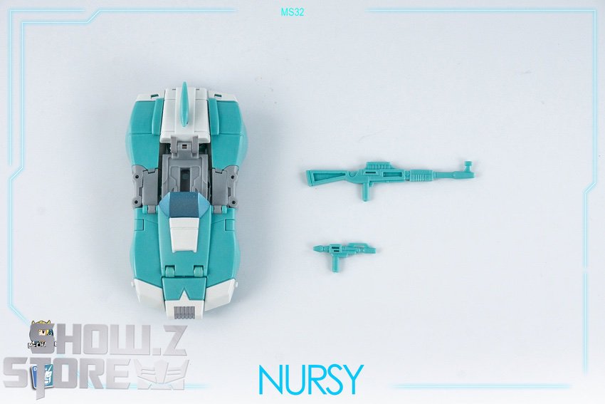 Arcee vehicle form teal blue compact car mode overhead view Arcee vehicle form teal blue compact car mode overhead view
