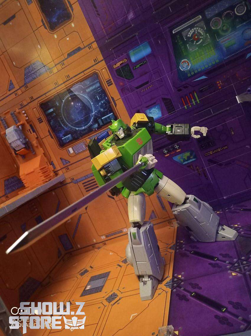 Green and yellow X-transbots MX-10 Virtus Springer robot in vehicle mode Green and yellow X-transbots MX-10 Virtus Springer robot in vehicle mode