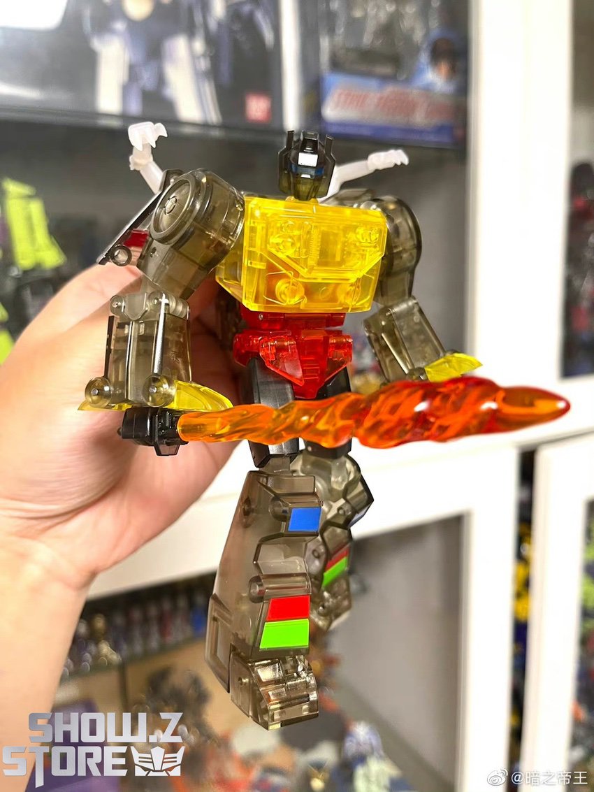 Grimlock Clear Version front pose extended arms holding orange blade Grimlock Clear Version front pose extended arms holding orange blade