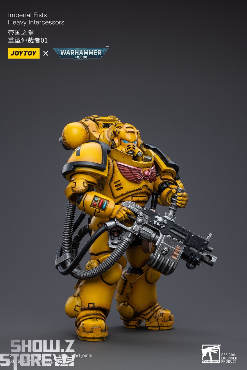 JoyToy Imperial Fists Heavy Intercessors 01 yellow armor gun pose JoyToy Imperial Fists Heavy Intercessors 01 yellow armor gun pose