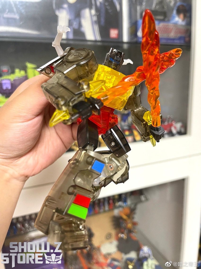Grimlock Clear Version standing pose bright yellow chest red accents Grimlock Clear Version standing pose bright yellow chest red accents