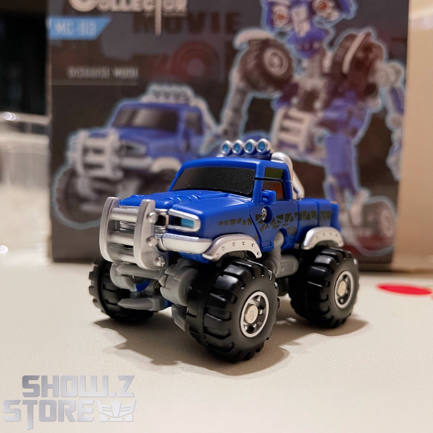 Little Monster Wheelie robot mode standing pose arm raised Little Monster Wheelie robot mode standing pose arm raised