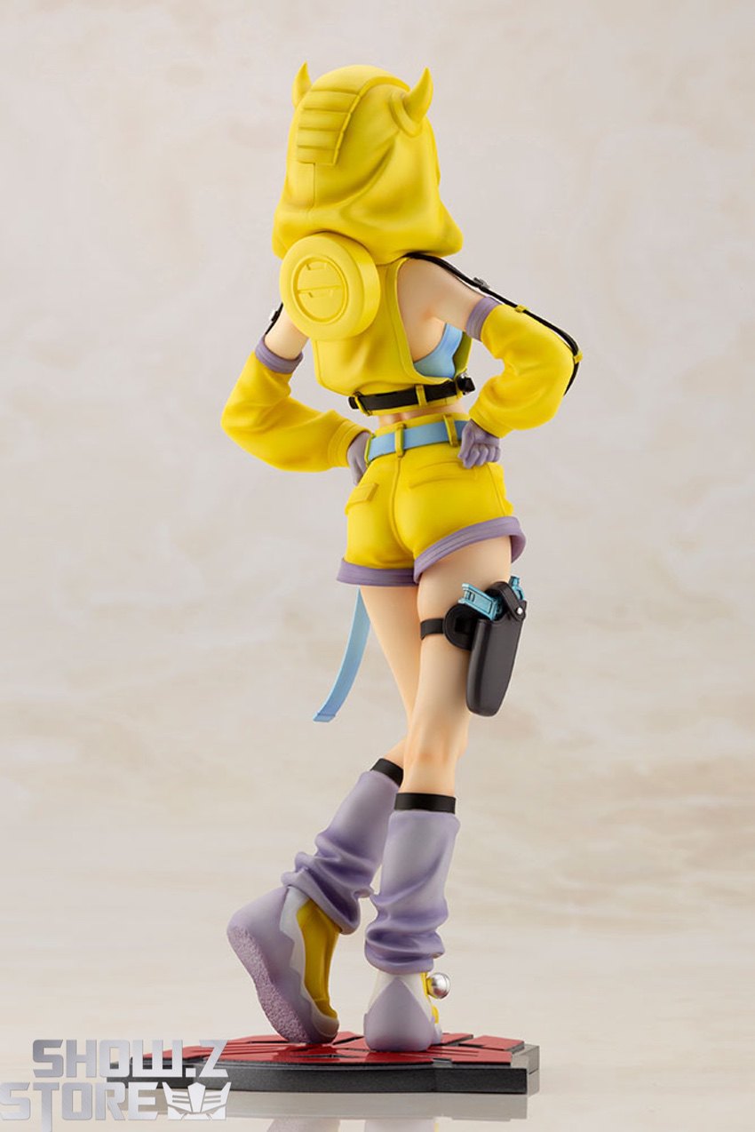 Back angle view yellow outfit purple leg warmers boots display Back angle view yellow outfit purple leg warmers boots display