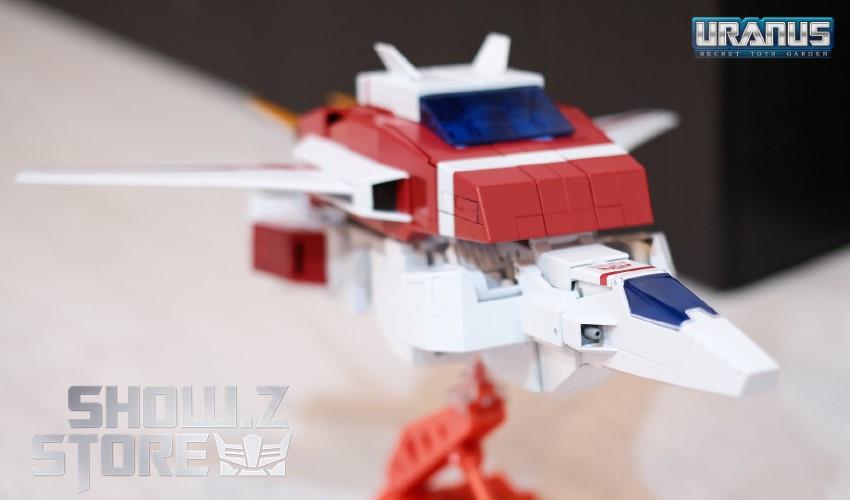 Takara Tomy MP-57 Skyfire aircraft transformation mid-configuration side Takara Tomy MP-57 Skyfire aircraft transformation mid-configuration side