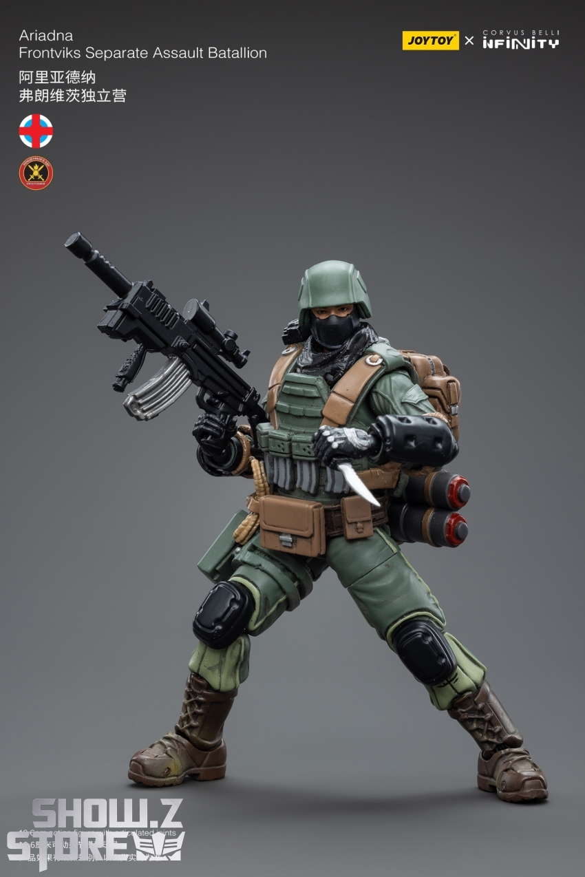 Three-quarter angle showing tactical equipment and body armor detail Three-quarter angle showing tactical equipment and body armor detail