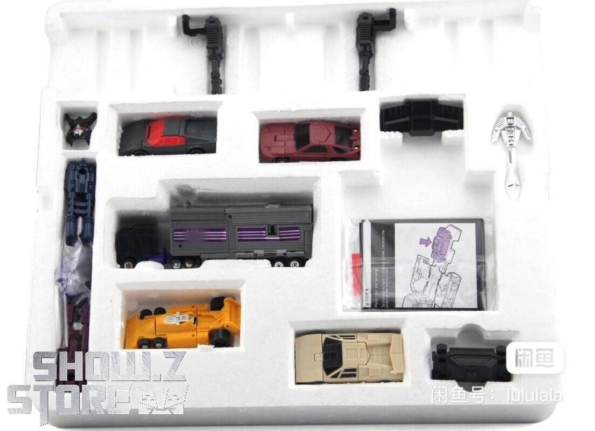 Complete Menasor combiner set showing all five individual robots and instruction materials Complete Menasor combiner set showing all five individual robots and instruction materials