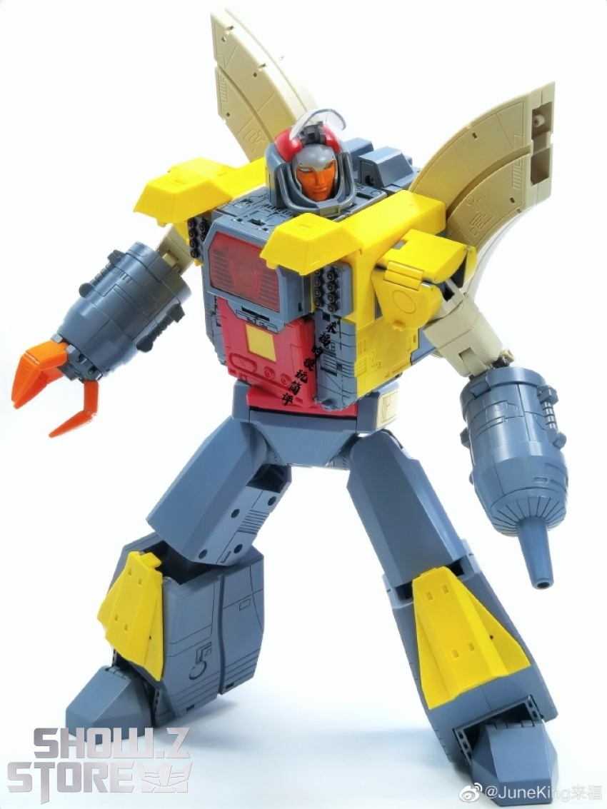 Newage Michael Omega Supreme green gold wings flying attack mode Newage Michael Omega Supreme green gold wings flying attack mode