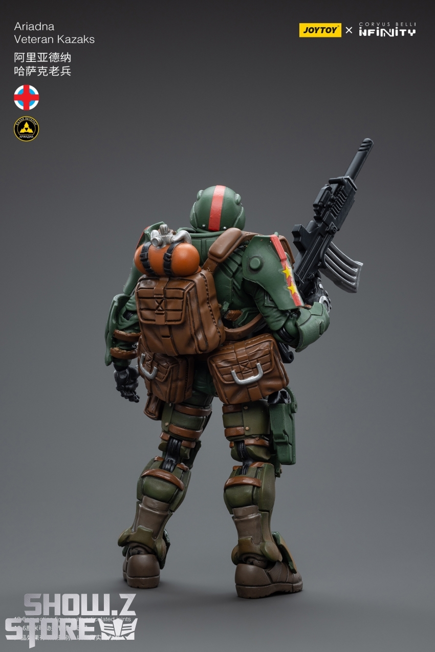 Back view revealing heavy backpack and tactical equipment loadout Back view revealing heavy backpack and tactical equipment loadout