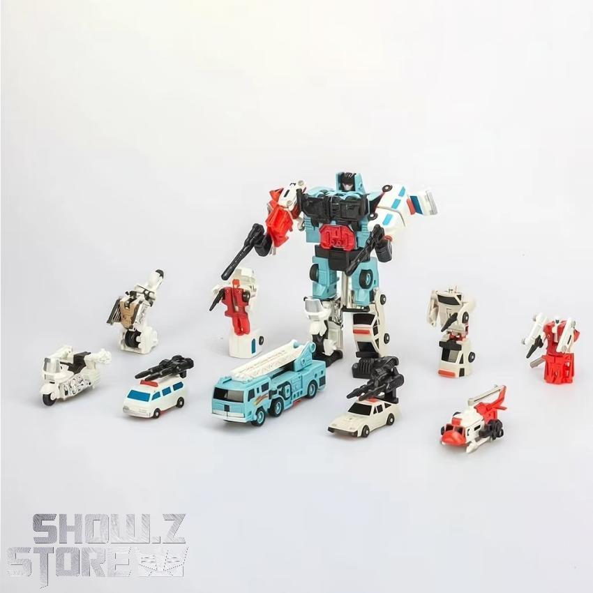 4th Party Transformers G1 Defensor robot with turquoise and red combining components displayed 4th Party Transformers G1 Defensor robot with turquoise and red combining components displayed