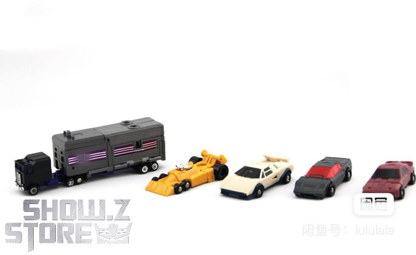 Gray truck combiner with yellow orange and cream vehicle components in arranged display Gray truck combiner with yellow orange and cream vehicle components in arranged display