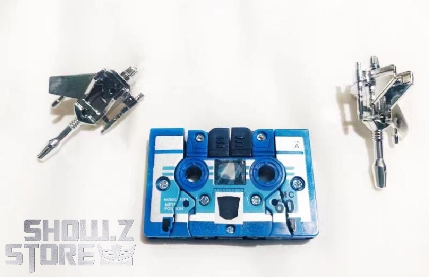 Decepticon cassette robots Frenzy and Laserbeak displayed with blue cassette carrier Decepticon cassette robots Frenzy and Laserbeak displayed with blue cassette carrier