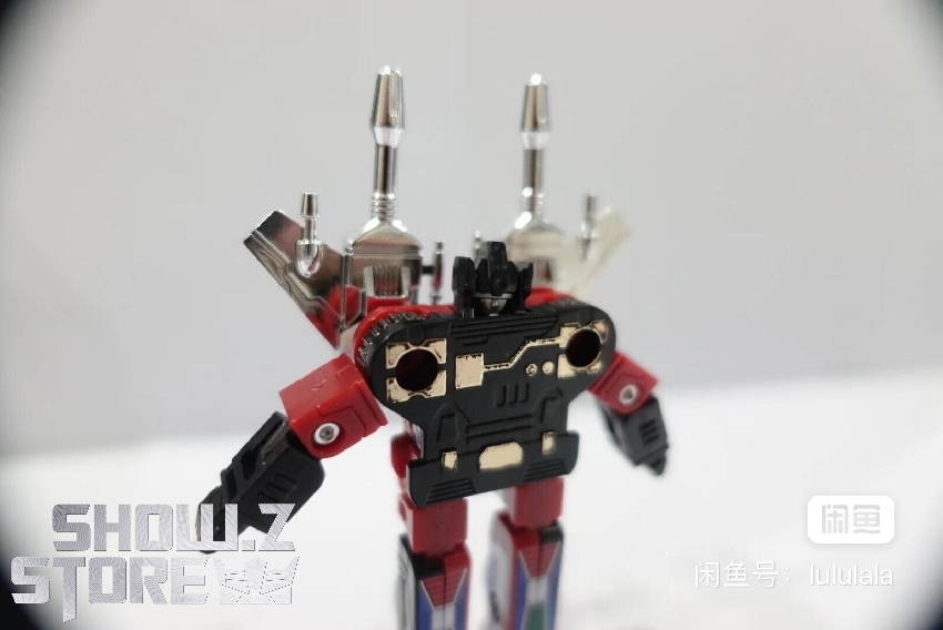 Red and black cassette sized mini transformers with white accent markings detail Red and black cassette sized mini transformers with white accent markings detail