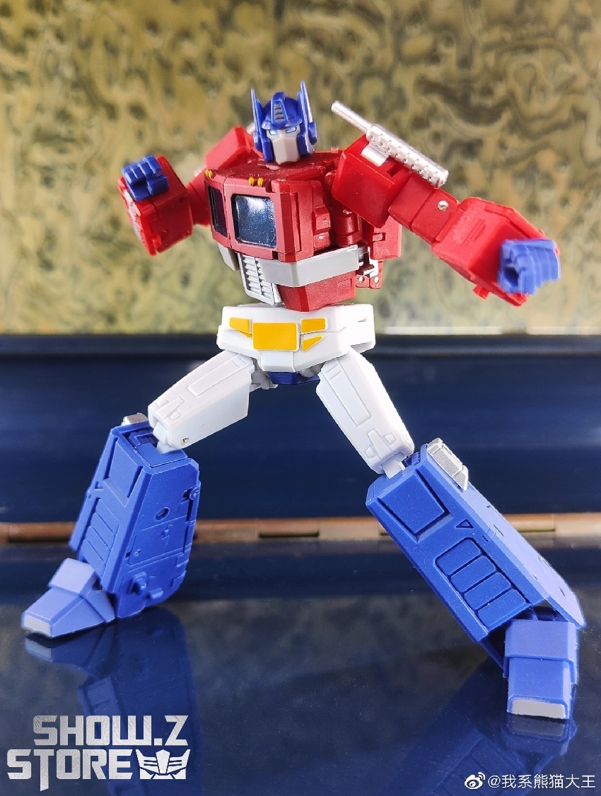 Transformer action figure with cyan blue armor plating and sophisticated detailing Transformer action figure with cyan blue armor plating and sophisticated detailing