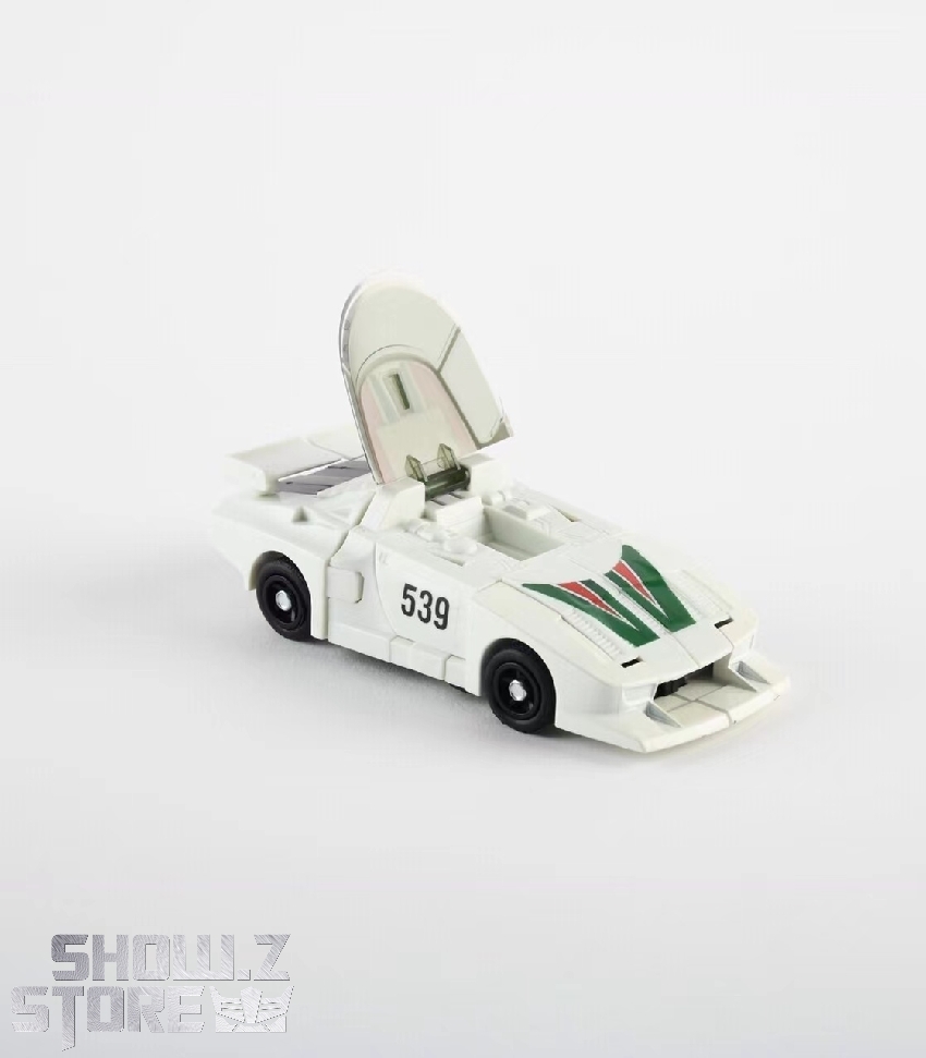 Transformers G1 Wheeljack racing car collectible figure in vehicle transformation Transformers G1 Wheeljack racing car collectible figure in vehicle transformation
