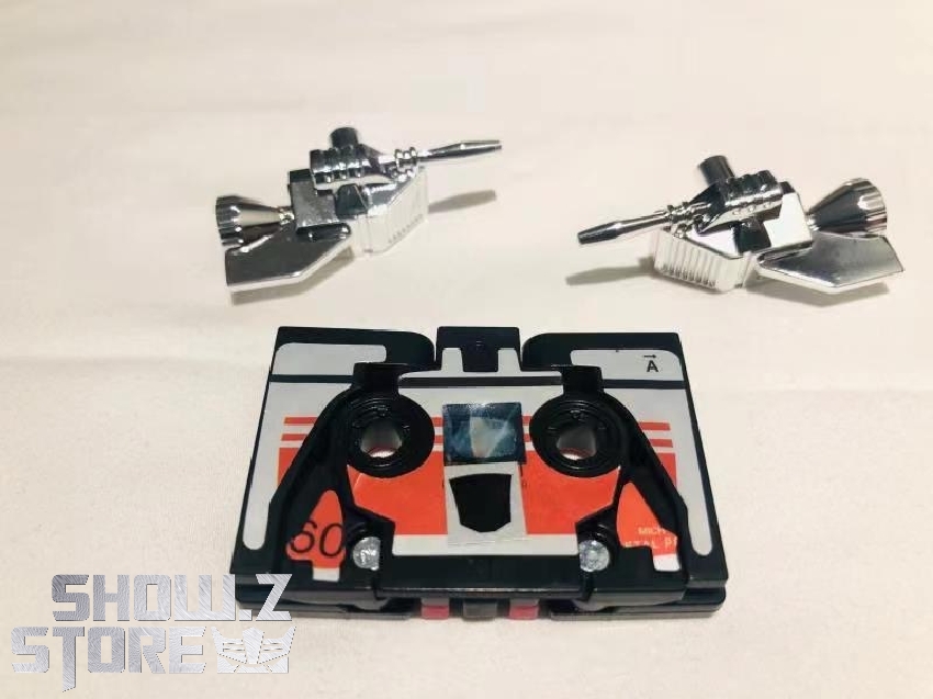 Frenzy cassette robot alt mode shown from front and side angles Frenzy cassette robot alt mode shown from front and side angles