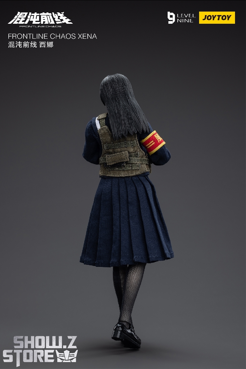 Xena character from behind in blue military uniform with long dark hair Xena character from behind in blue military uniform with long dark hair